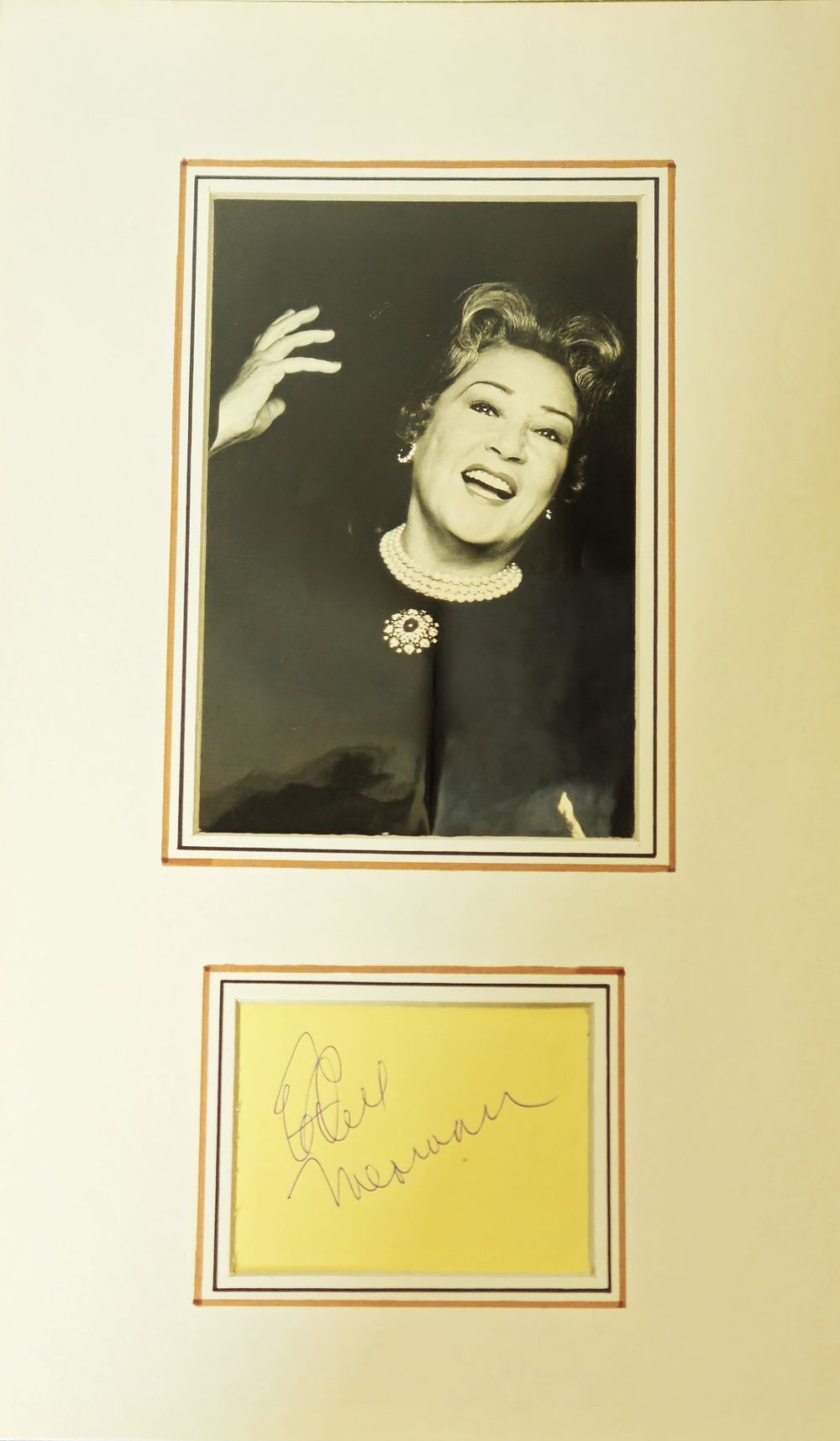 Lot 271: Ethel Merman signature piece mounted below black and...