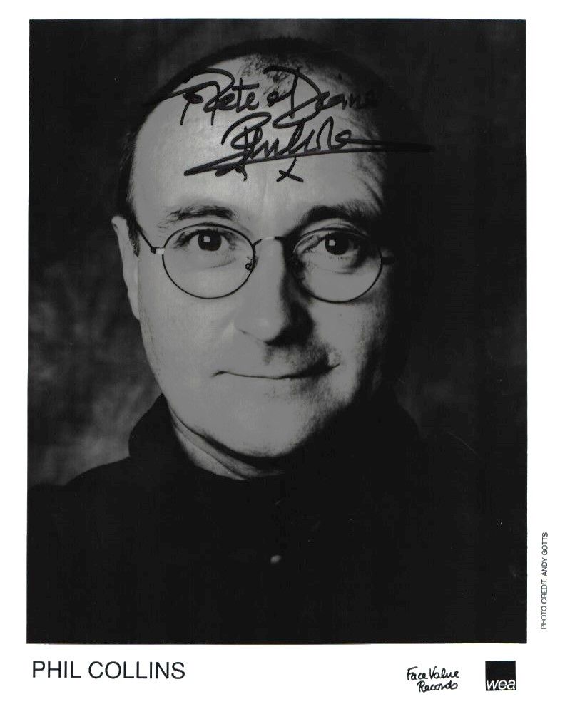 Lot 296: Phil Collins signed 10x8inch black and white promo...