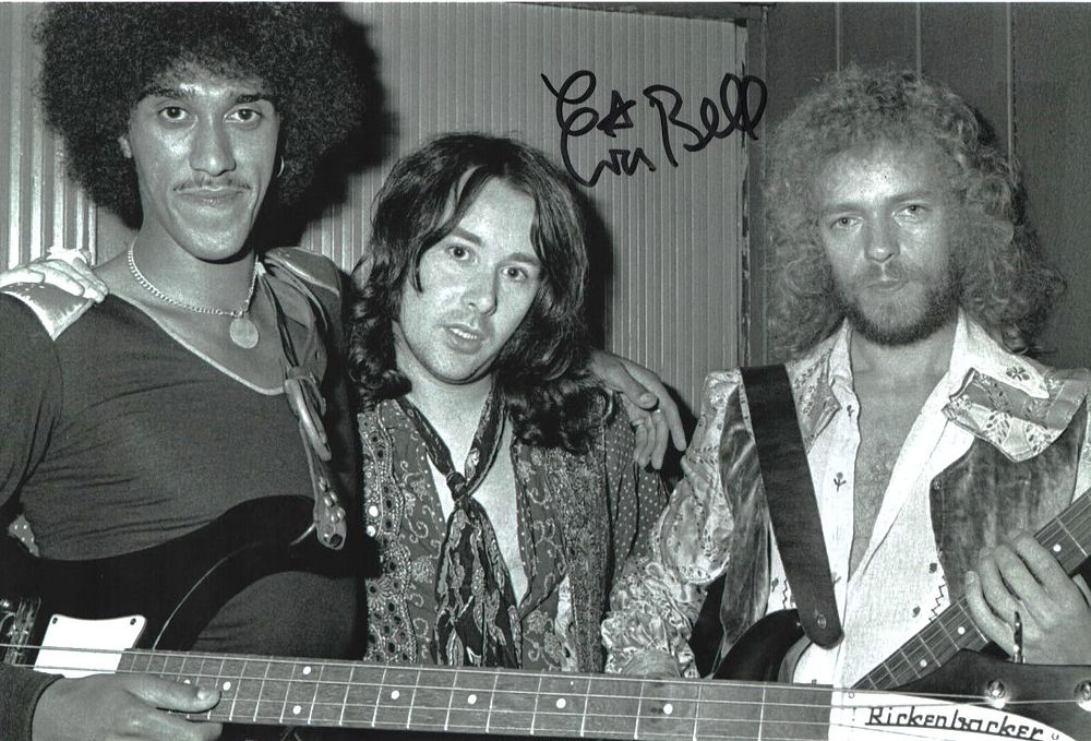 Lot 312: Eric Bell signed Thin Lizzy 12x8inch black and...