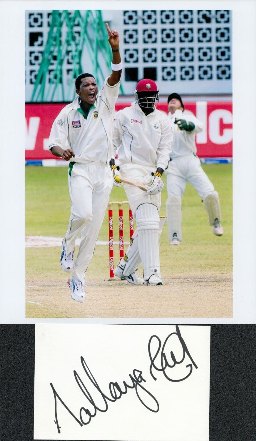 Lot 692: Makhaya Ntini signed 6x4 white card and 10x8...