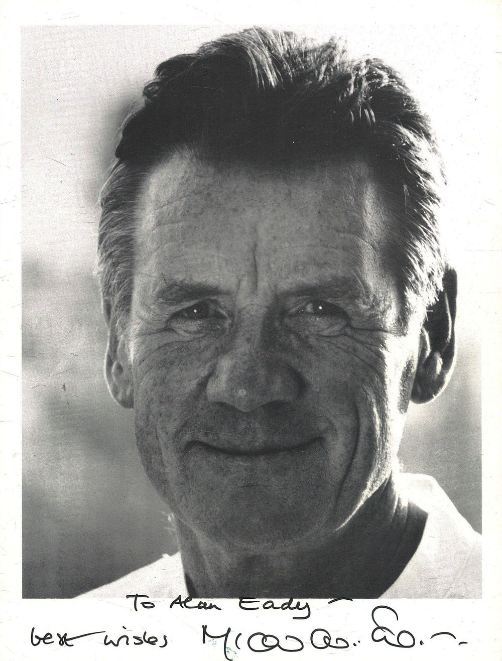 Lot 167: Michael Palin signed 8x6inch black and white photo....