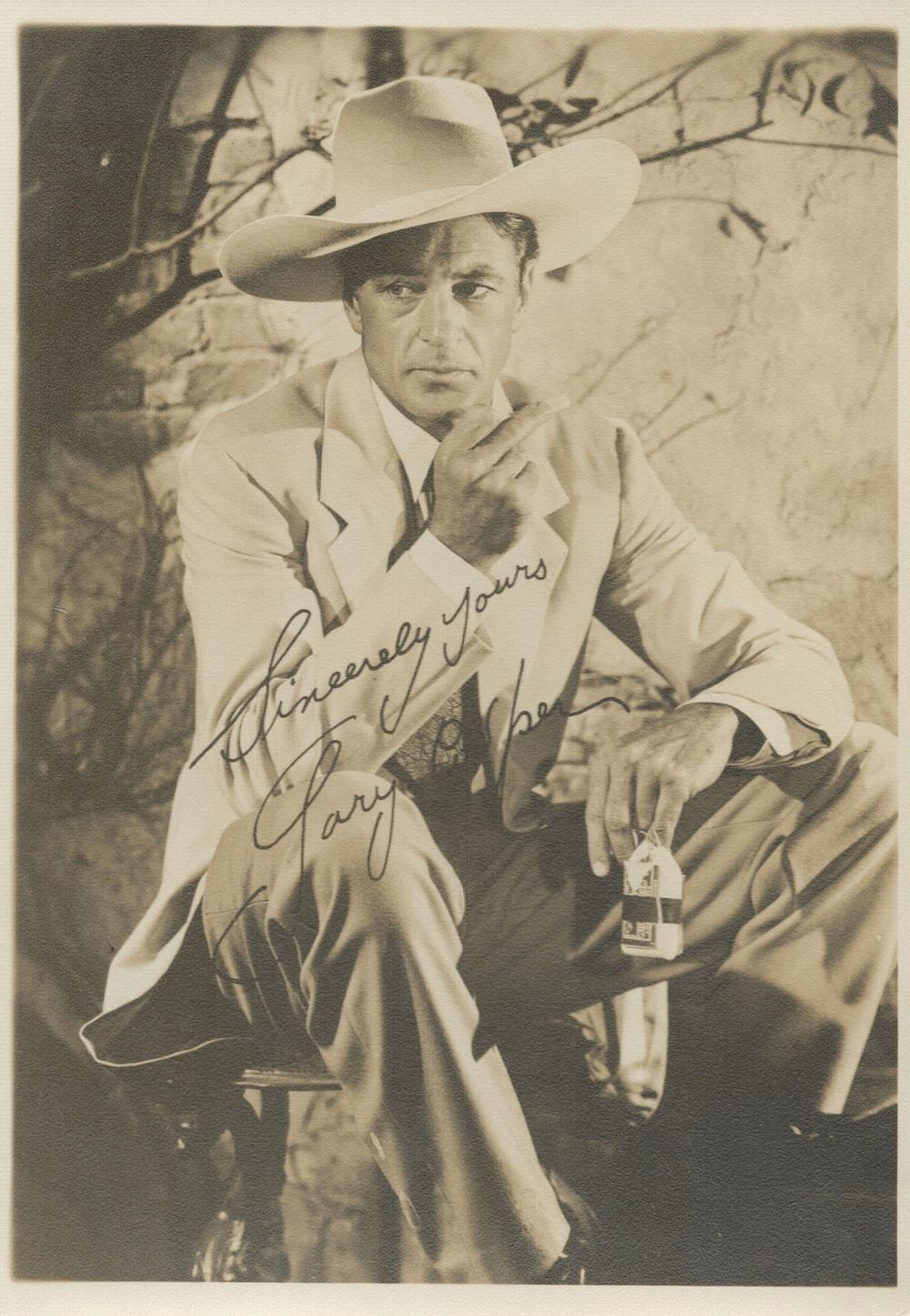 Lot 215: Gary Cooper American Actor signed 7x5 inch black...