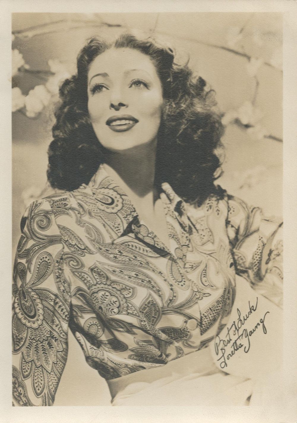 Lot 216: Loretta Young American Actress signed 7x5 inch black...
