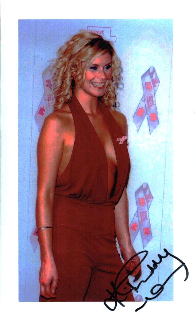 Lot 267: KIM TIDDY Actress signed 8x12 Photo. Good condition....