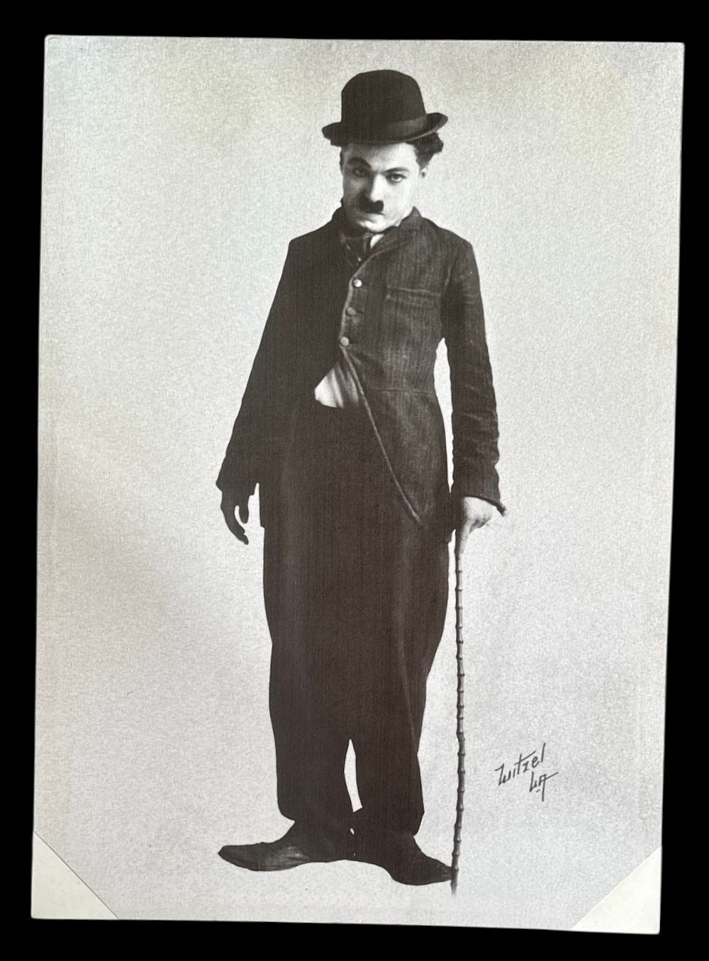 Lot 304: Charlie Chaplin black and white print on canvas...