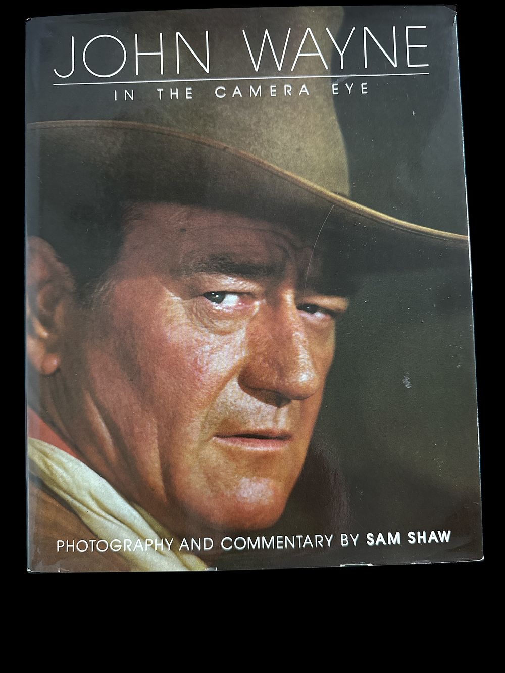 Lot 322: John Wayne in the camera eye First Edition...