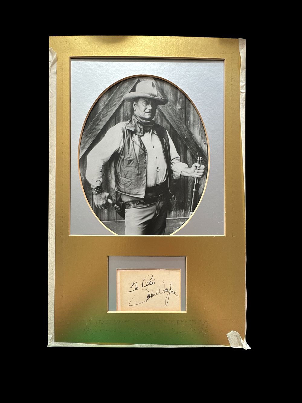 Lot 396: John Wayne Signature piece with black and white...