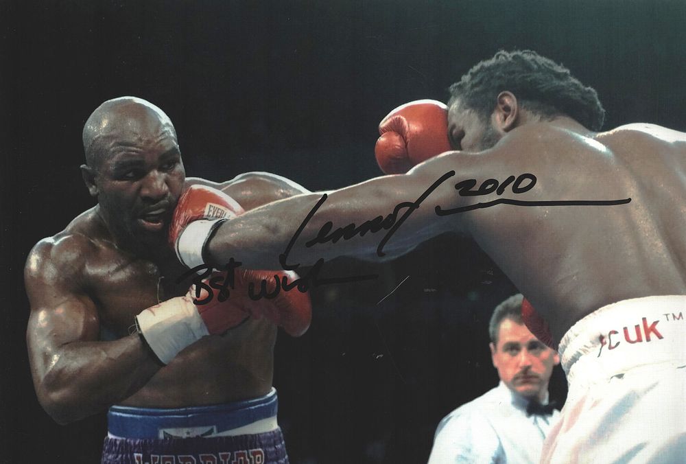 Lot 176: LENNOX LEWIS signed Boxing Evander Holyfield 8x12 Photo.