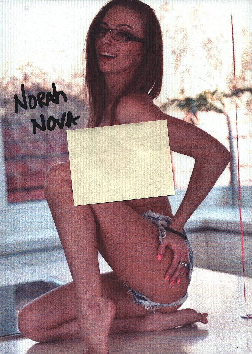Lot 380: Norah Nova signed 7x5inch risque photo.