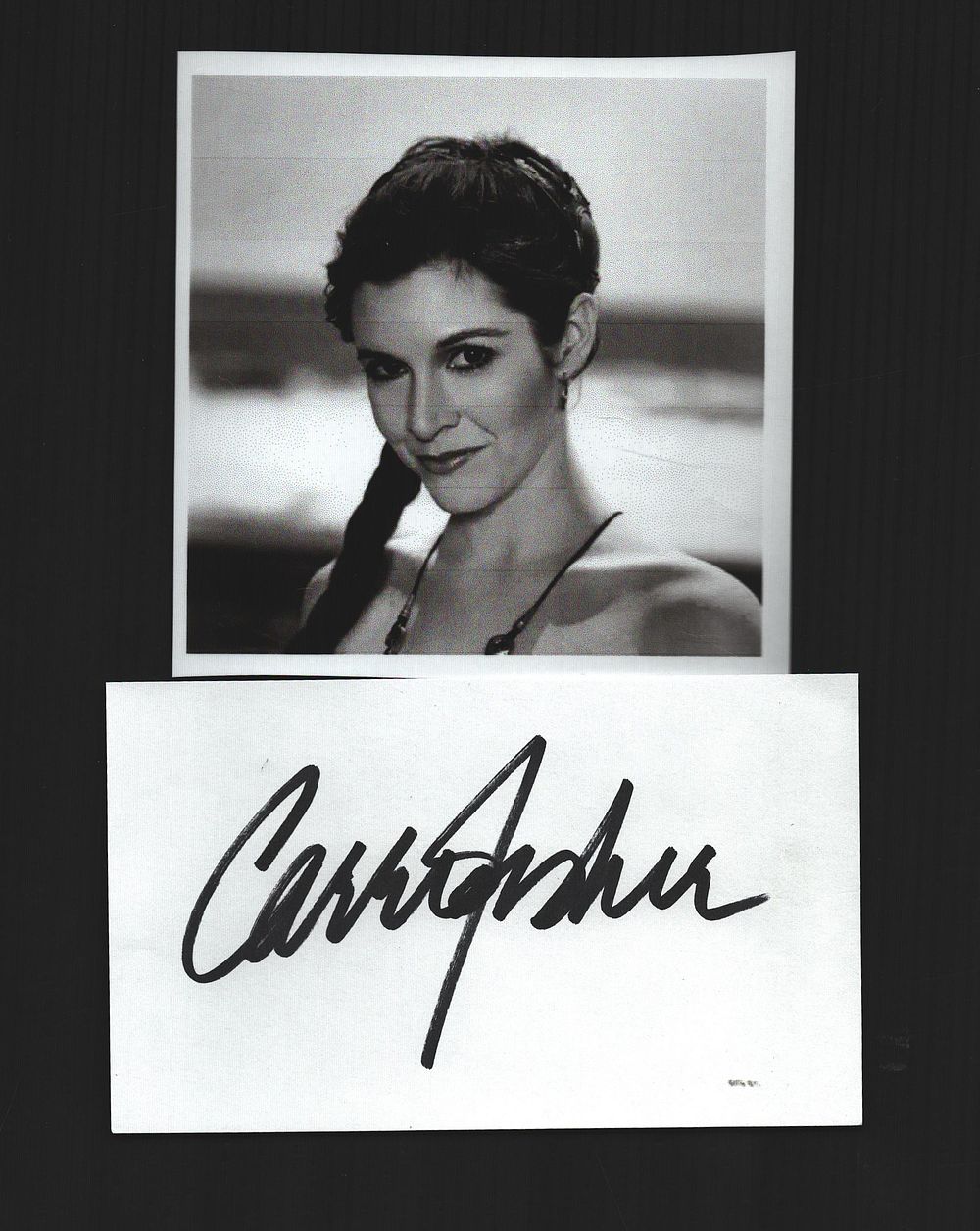 Lot 382: Carrie Fisher signed white card with unsigned black...