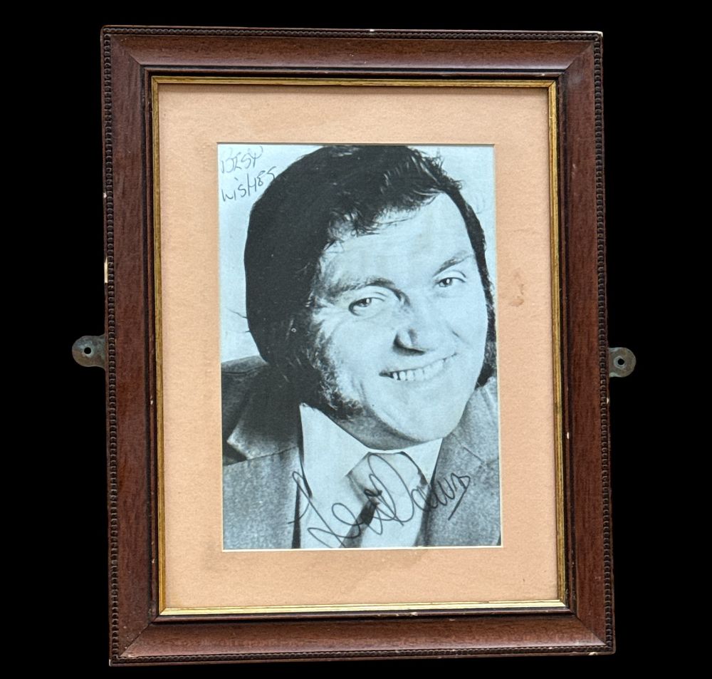 Lot 167: Les Dawson signed 15x12inch framed and mounted black...