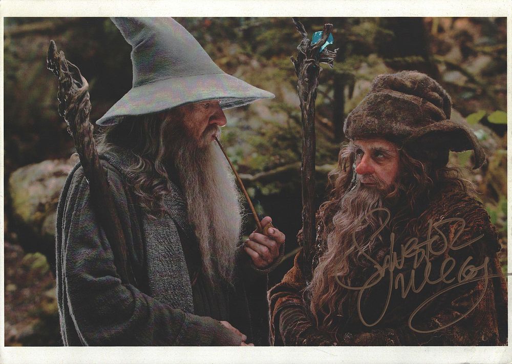 Lot 274: Sylvester McCoy signed colour photo 11.5x8.5 inch Approx....