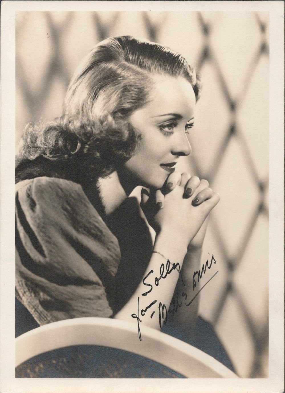 Lot 195: Bette Davis signed 7x5inch vintage photo. Dedicated. Good...