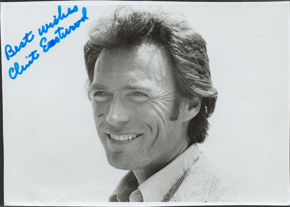 Lot 196: Clint Eastwood signed 7x5inch black and white photo....