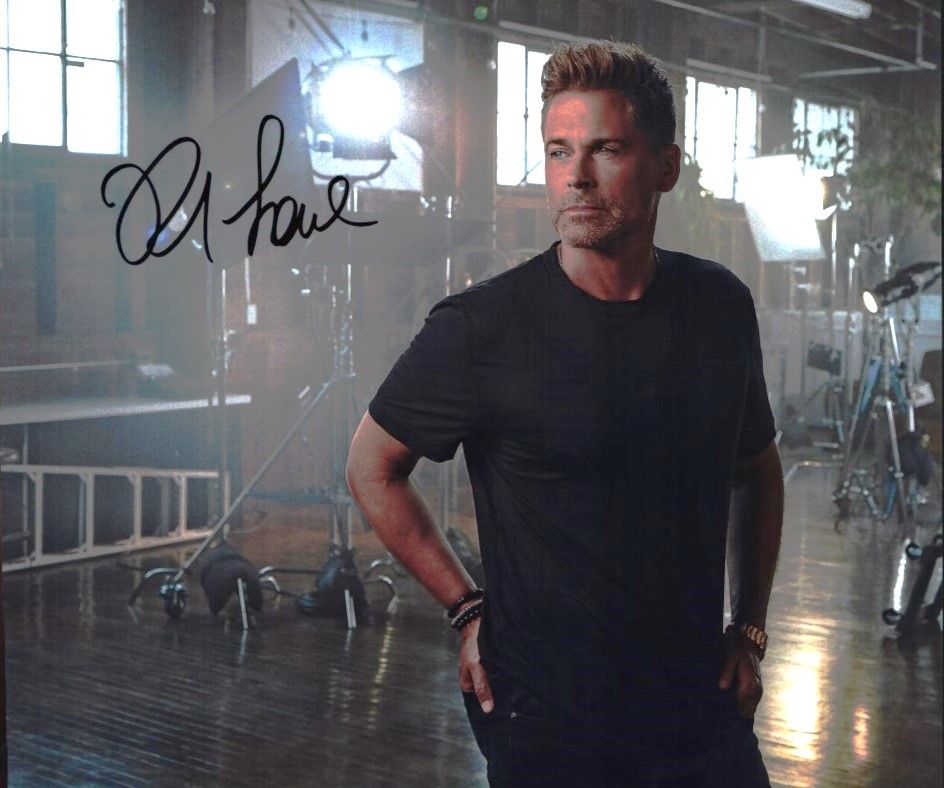 Lot 201: Rob Lowe signed 10x8inch colour photo.