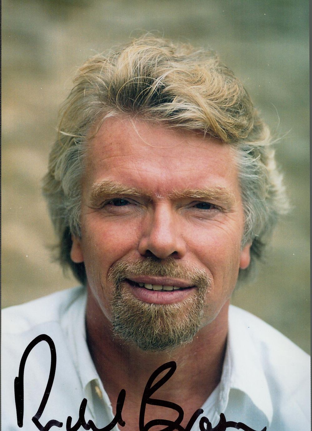 Lot 207: Richard Branson signed 8x6inch colour photo. Good condition....