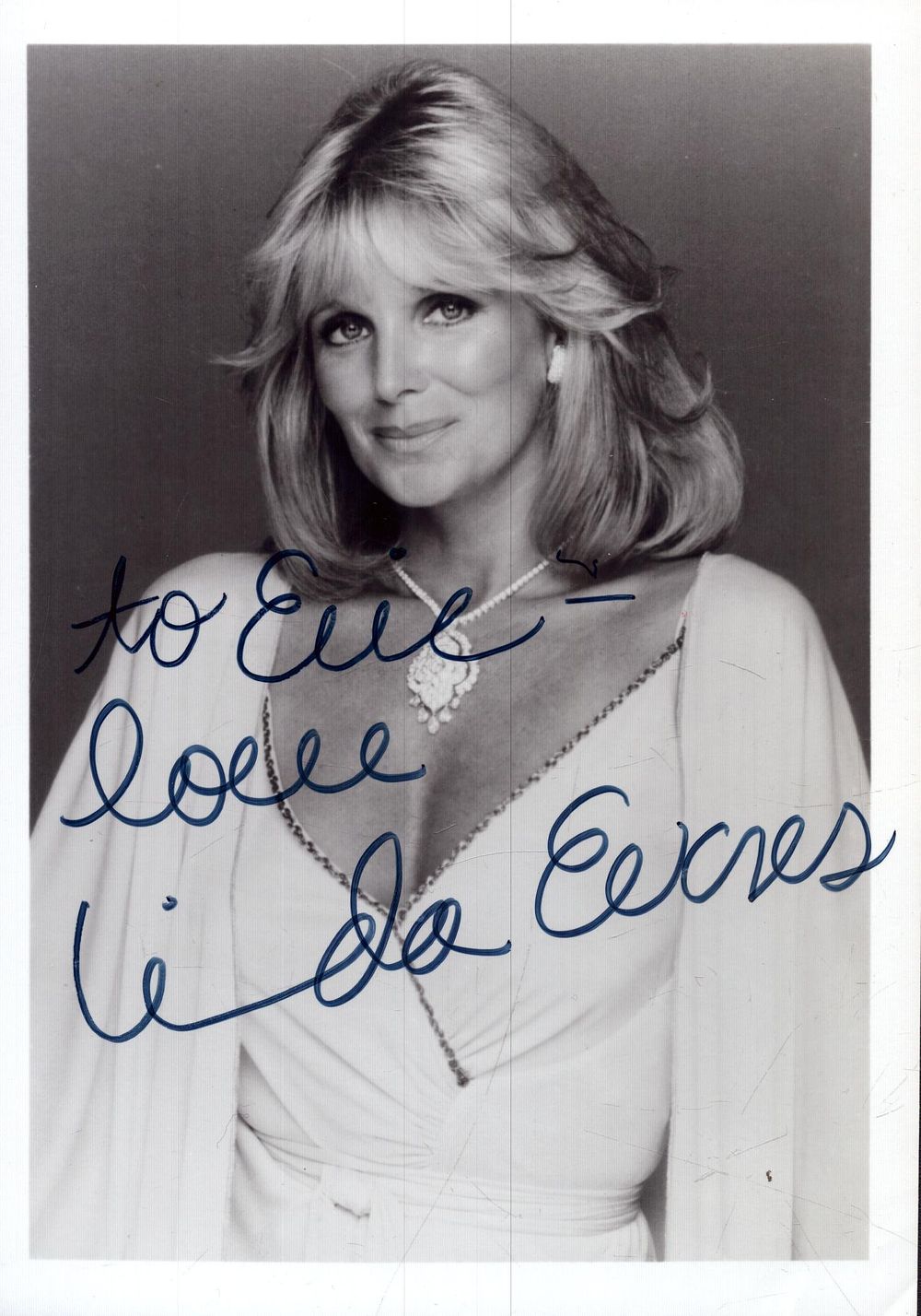 Lot 329: Linda Evans signed 7x5inch black and white photo....