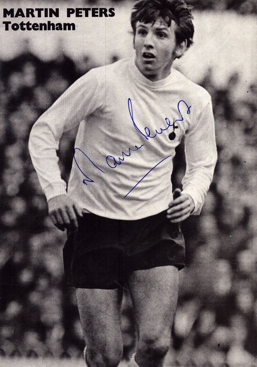 Lot 695: Martin Peters signed magazine page black and white...