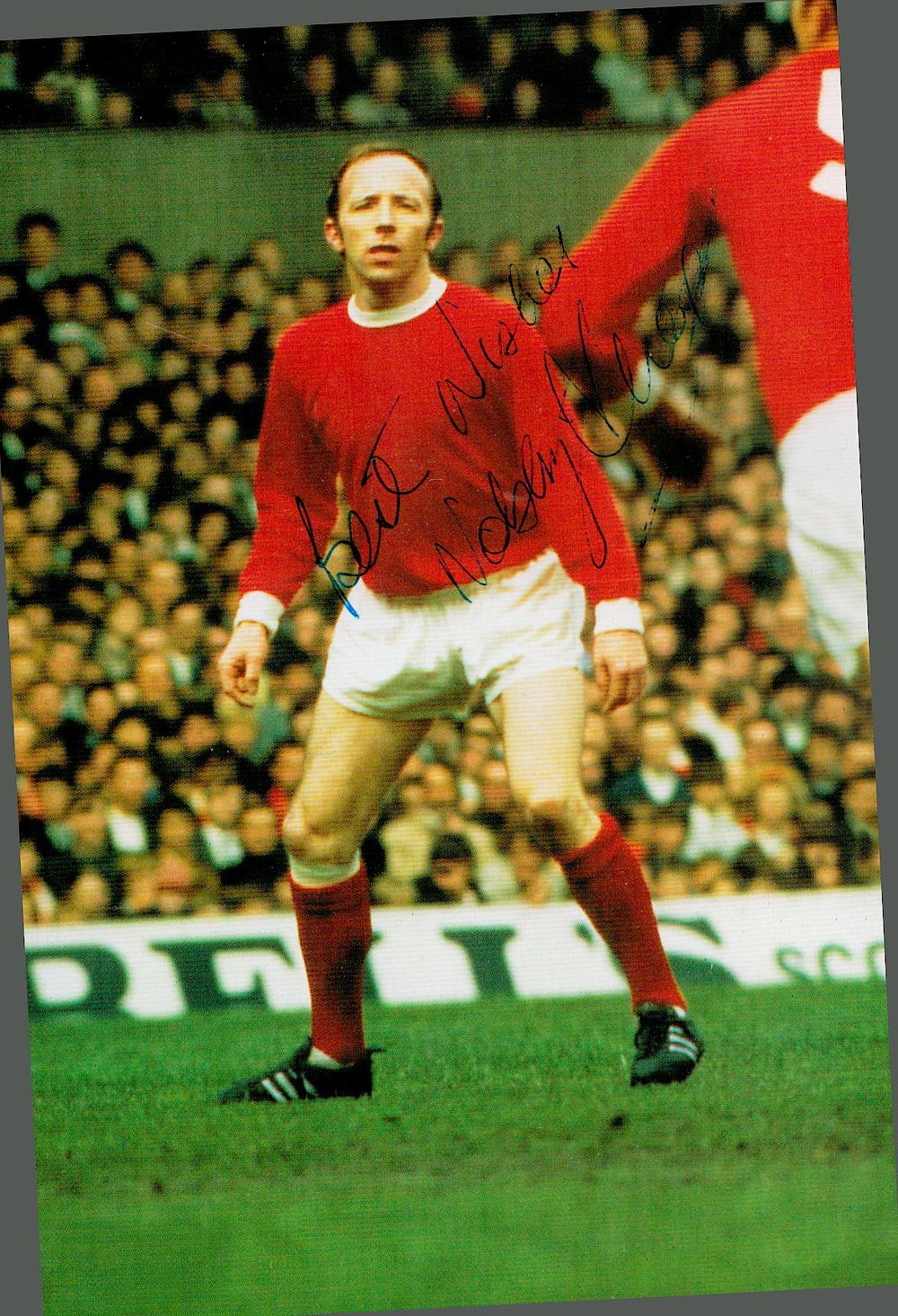 Lot 340: Nobby Stiles signed 6x4inch colour photo. Good condition....
