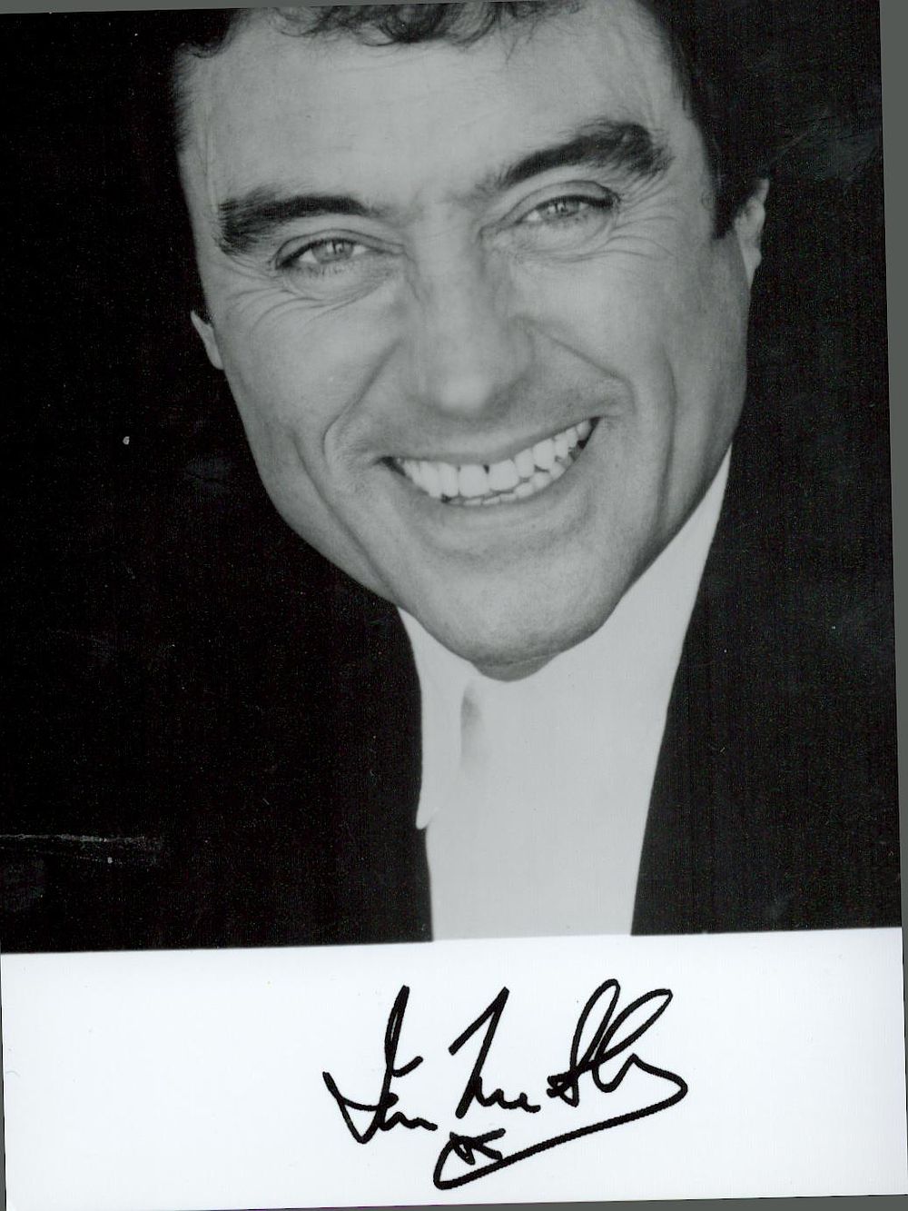 Lot 377: Ian McShane signed 6x4inch black and white photo....