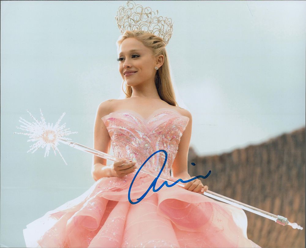 Lot 385: Ariana Grande signed 10x8inh colour photo. Good condition....