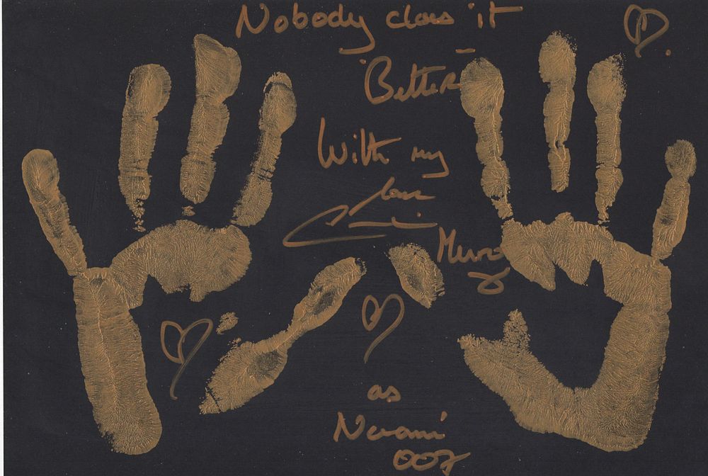 Lot 603: Caroline Munro personally applied left and right handprints...