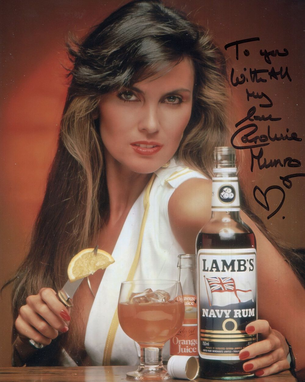 Lot 664: Caroline Munro signed 8x10 colour photo advertising Lamb's...
