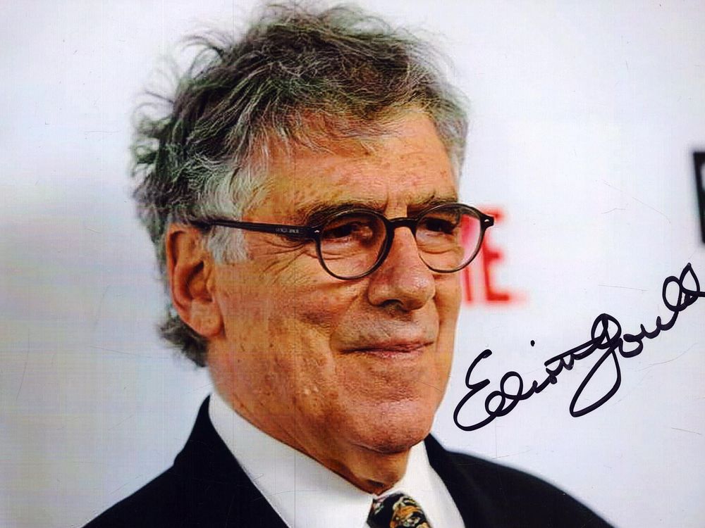 Lot 216: Elliott Gould signed 7x5inch colour photo. Good condition....