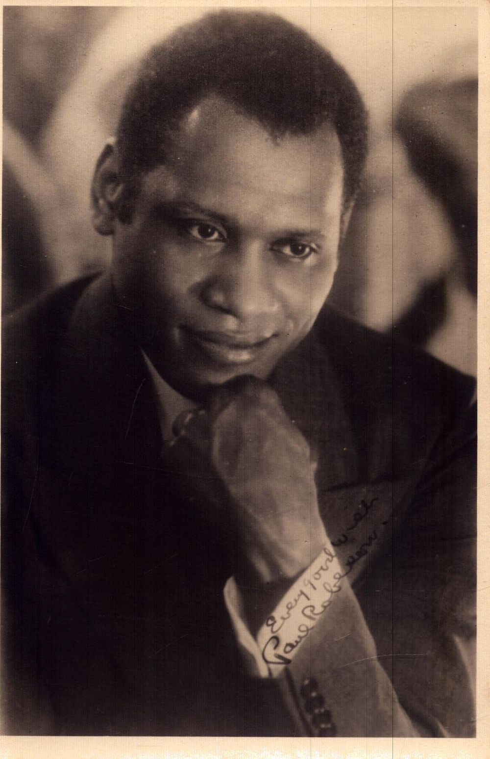 Lot 228: Paul Robeson signed 6x4inch black and white photo....