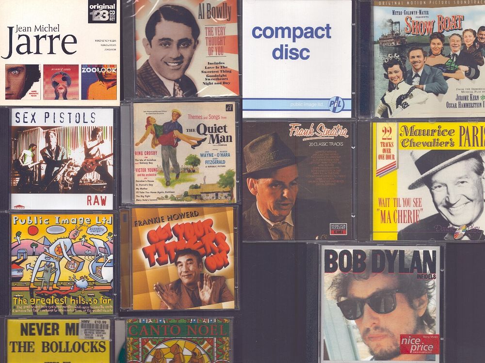 Lot 493: CD Collection of 13, including Bob Dylan, Sex...