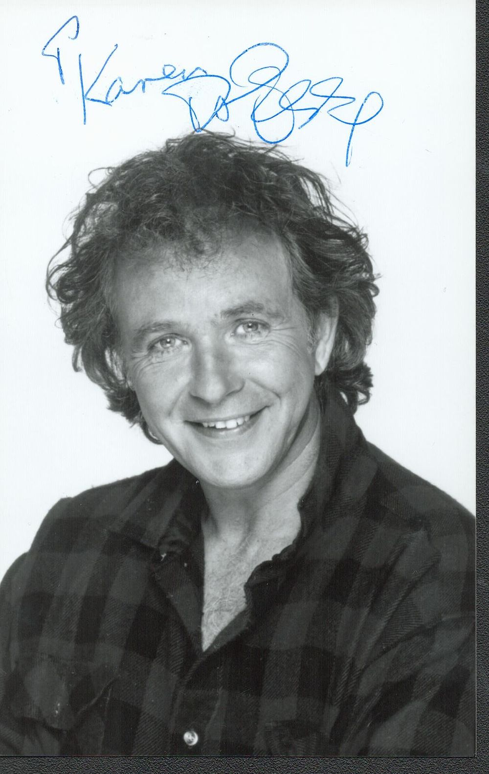 Lot 572: David Essex signed black and white photo 5x4....