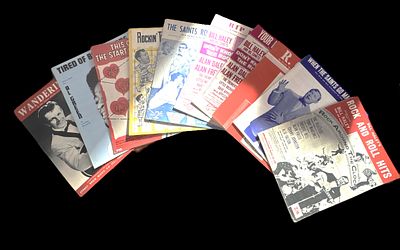 Music score sheet 10 in collection includes. Your Love is My Love, R.O.C.K, When The Saints Go 