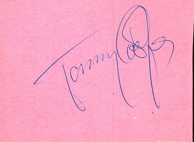 Tommy Cooper (1921–1984) British comedian and magician who was famous for wearing a red fez 