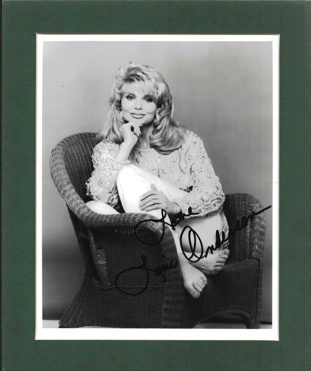 Lot 193: Loni Anderson signed black and white photo. Mounted,...