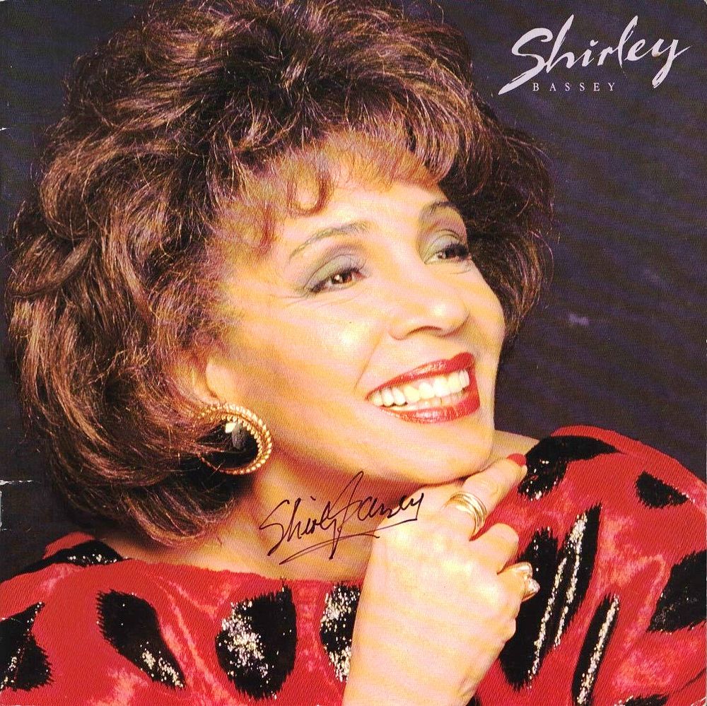 Lot 198: Shirley Bassey signed vinyl record sleeve. Good condition....