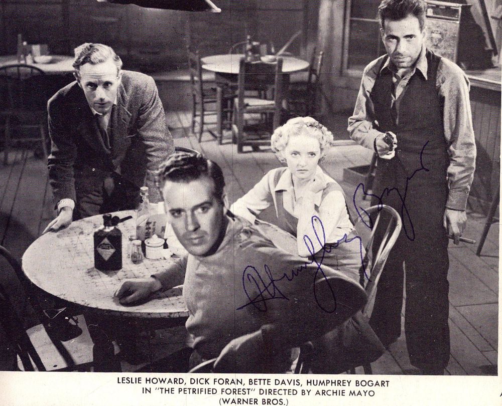 Lot 470: Humphrey Bogart signed magazine black and white photo...