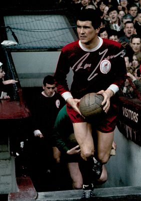 Ron Yeats signed 12x8inch colour photo pictured while captain of Liverpool F.C. Good condition. 