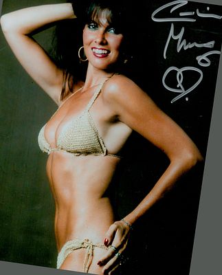 Caroline Munro signed 10x8inch colour photo. Good condition. All with a Certificate of 