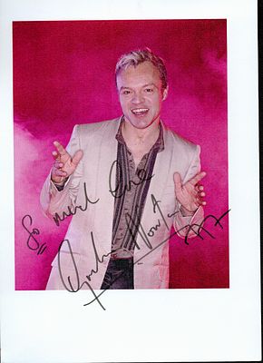 Graham Norton signed 8x6inch colour photo. Dedicated. Good condition. All autographs come with 