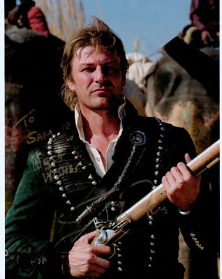 Sean Bean signed 10x8inch Sharpe colour photo. Dedicated. Good condition. All with a 