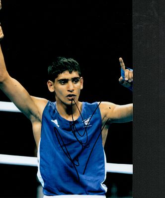 Amir Khan signed 12x8inch colour photo. Good condition. All with a Certificate of Authenticity. 