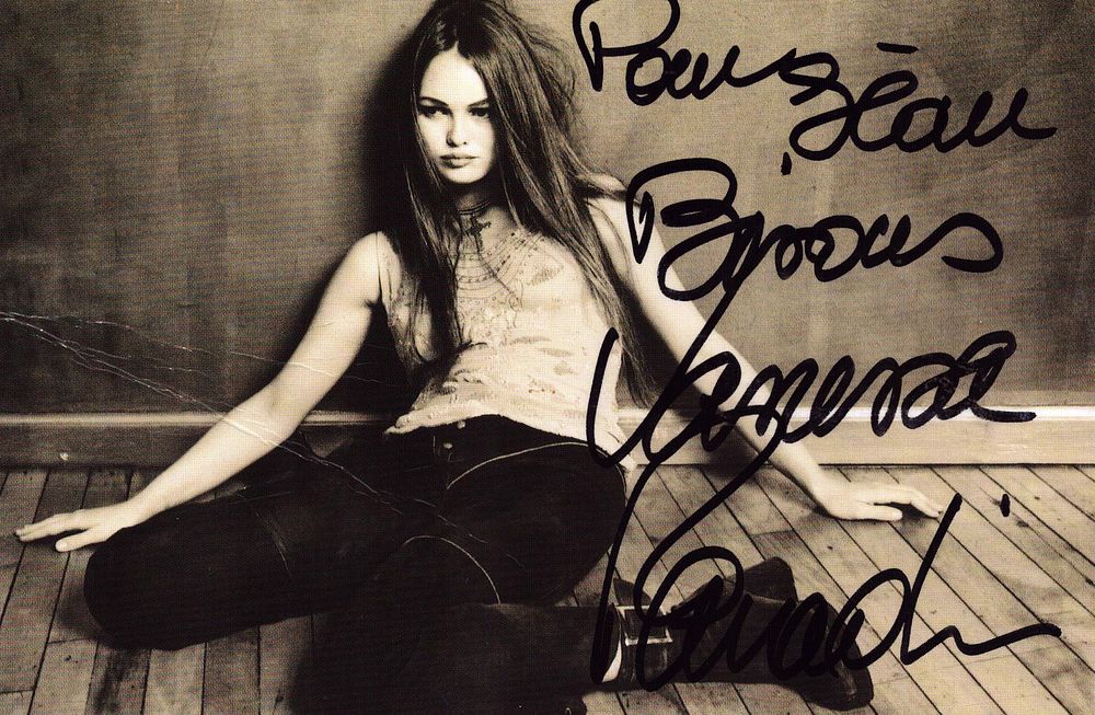 Lot 229: Vanessa Paradis signed 6x4 inch black and white...