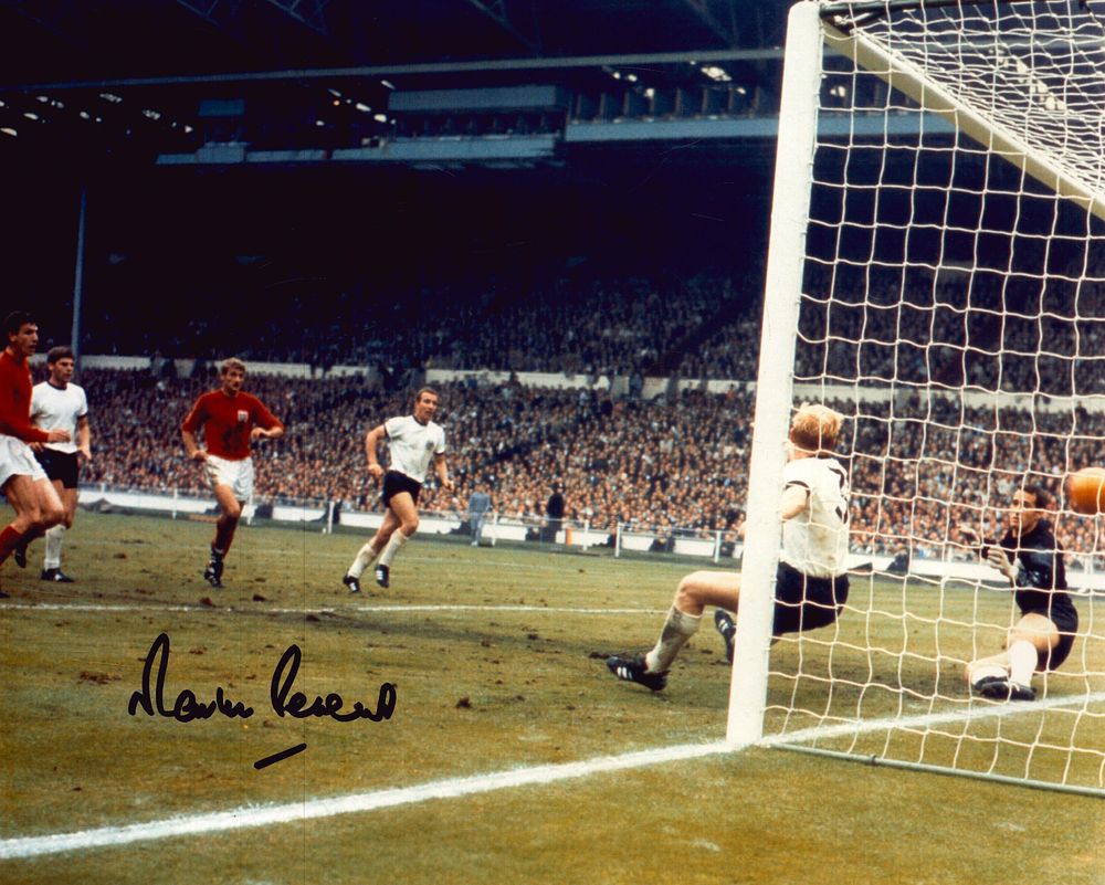 Lot 300: Football. Martin Peters Signed 10x8 colour photo. Photo...
