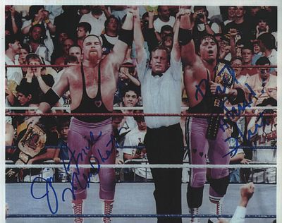 Jim Anvil Neidhart and Brett Hitman Hart signed Hart Foundation 10x8inch colour photo.