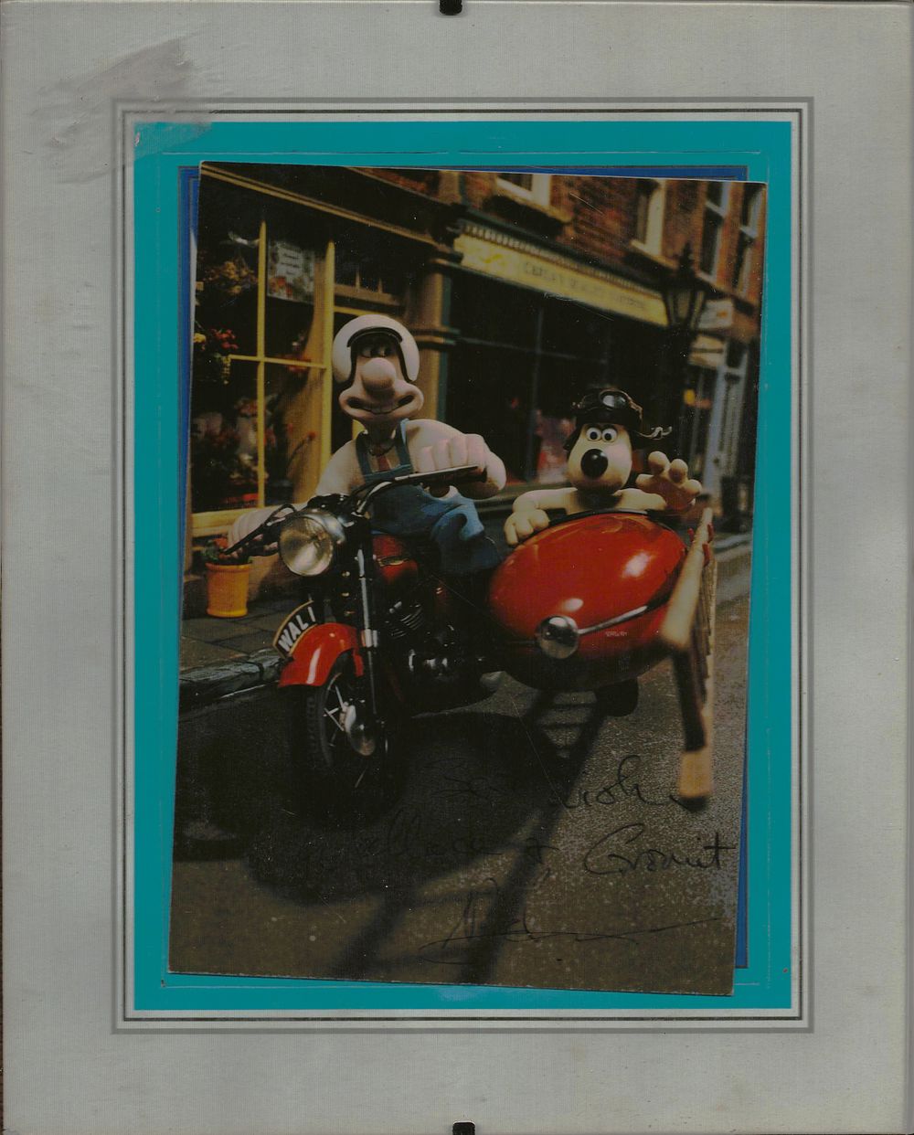 Lot 358: Nick Park signed 8x6inch colour Wallace and Gromit...