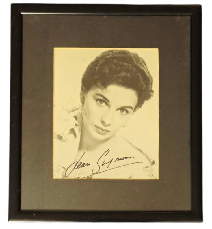 Lot 359: Jean Simmons signed black and white photo. Mounted...