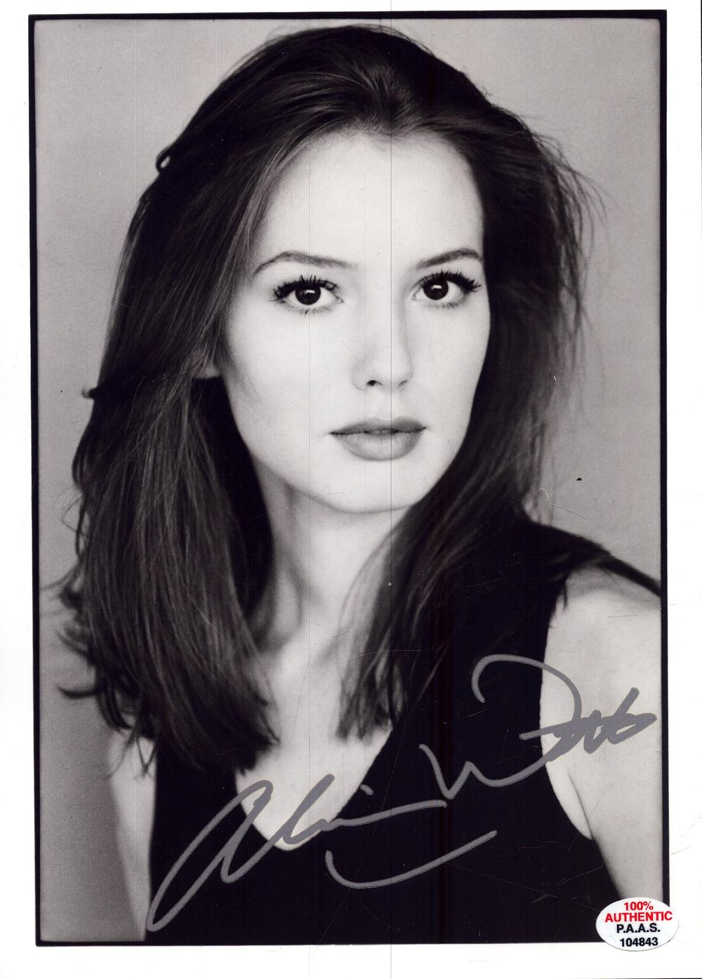 Lot 384: Alicia Witt signed 7x5inch black and white photo.