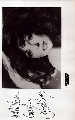 Joan Collins signed 8x5 inch appx black and white photo. Good condition. All autographs come 