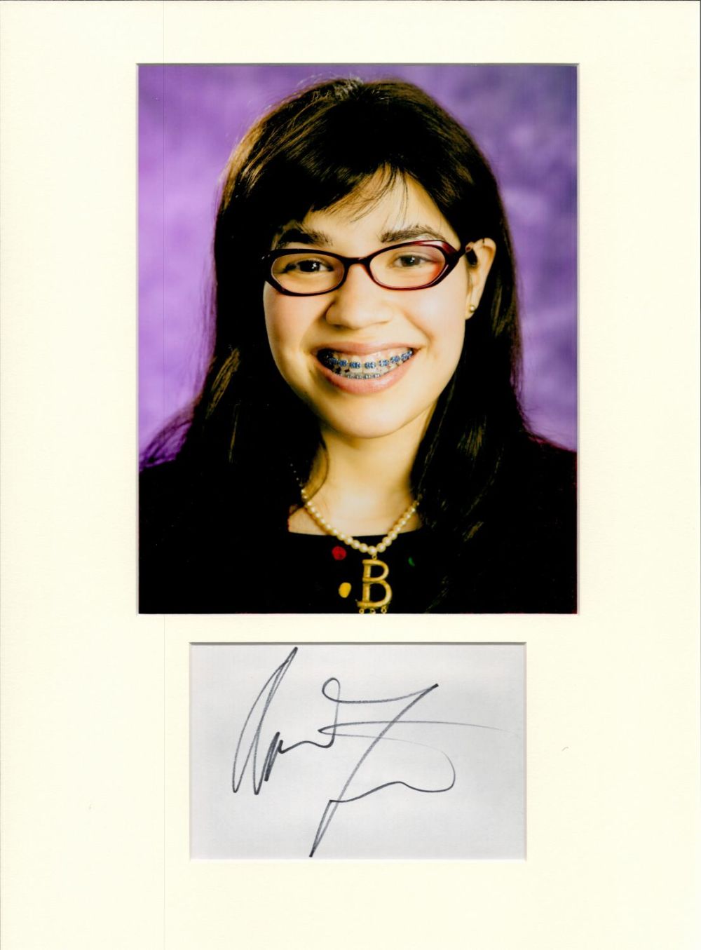 Lot 137: America Ferrera 16x12 overall Ugly Betty signature piece....