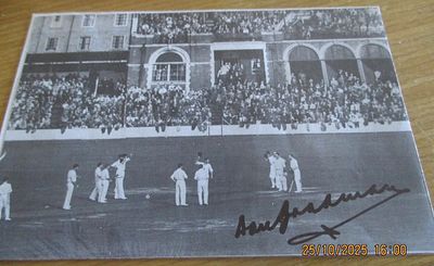 Don Bradman Australian Cricketer Signed Press cutting approx 6 x 4 inches. Bradman comes out to 